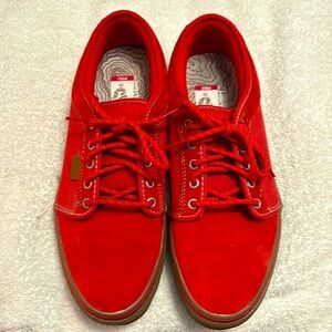 Vans - red lace ups.